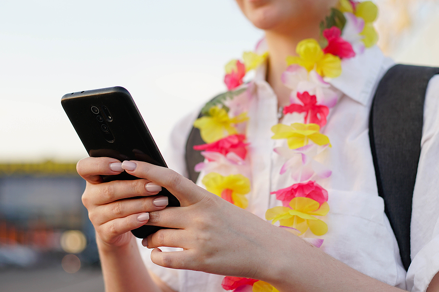 tourist wearing lei