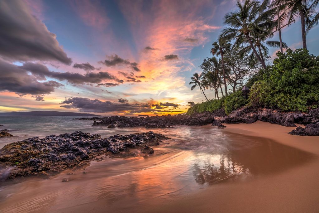 Colourful sunset from secret cove, Maui, Hawaii